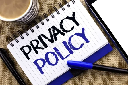 Privacy policy document with the words “PRIVACY POLICY” written on a notebook