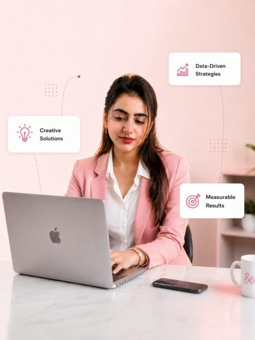 Saloni Kaur working on a laptop as a digital marketing consultant in a modern workspace with creative solutions, data-driven strategies, and measurable results.